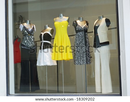 Boutique window with dressed mannequins