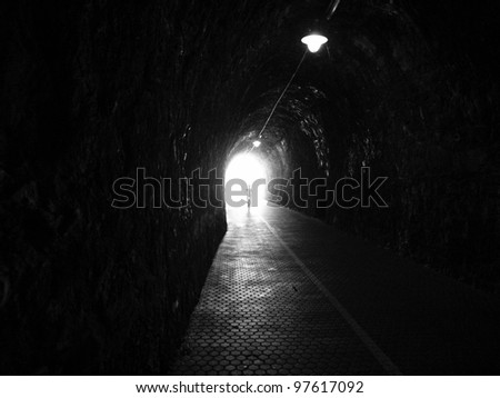 Human silhouette in tunnel, Light at End of Tunnel