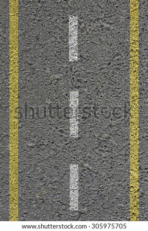 road-texture-with-two-yellow-and-dashed-white-stripe