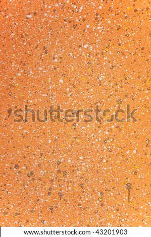 color splatter on a grungy rock wall abstract background