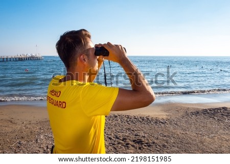 Similar – Foto Bild Fernglas mit der Küste Nizzas im Hintergrund