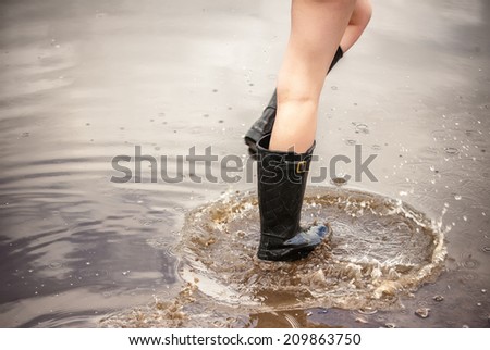 boots in the water close up