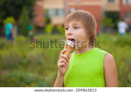 Little kid eating ice cream