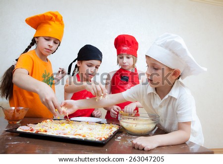 little chef in the kitchen preparing food