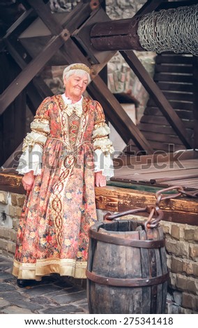 old woman in a Hungarian dress of the XVII century