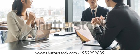 Multiple businessmen having a meeting