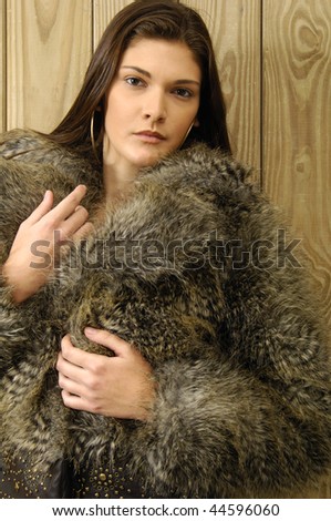 Fashion girl with winter fur coat