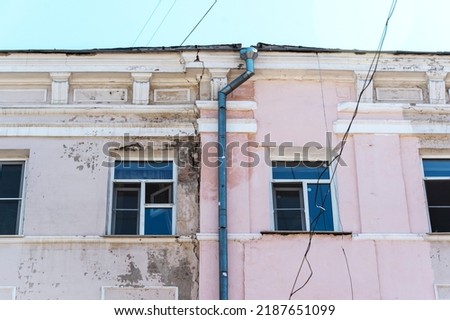 Similar – Foto Bild Schäbige Fassade eines Wohnhauses in der Stadt