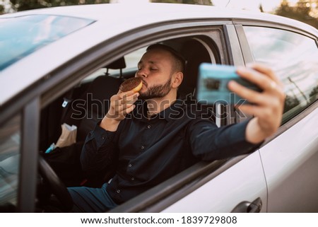 Similar – Image, Stock Photo Taking photos of donuts with the smartphone. Photographing food top view.