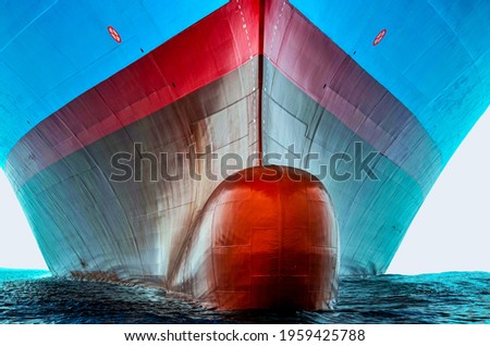 Front view of the large cargo ship bulbous bow, she is freshly painted.  