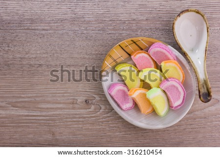 jelly sweet candy on wood background