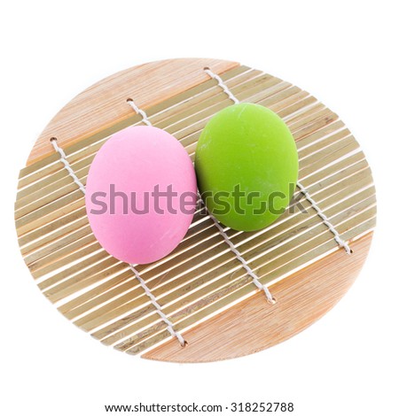 Easter eggs on bamboo tray isolate white background