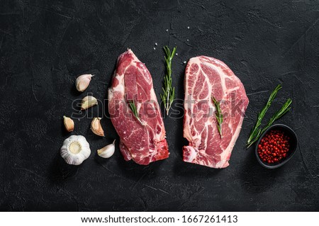 Similar – Foto Bild Rohes Schweinesteak auf einem Teller, Ansicht von oben. Steak isoliert auf blauem Hintergrund