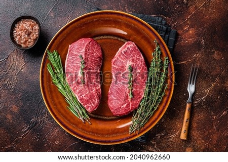 Raw Shoulder Top Blade cut, or Australia wagyu oyster blade beef steak. Dark background. Top View Foto stock © 