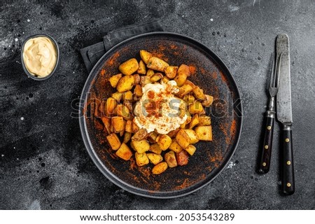 Similar – Image, Stock Photo Patatas bravas traditional Spanish potatoes snack tapas