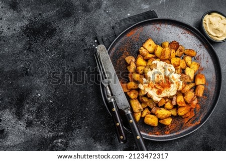 Similar – Image, Stock Photo Patatas bravas traditional Spanish potatoes snack tapas