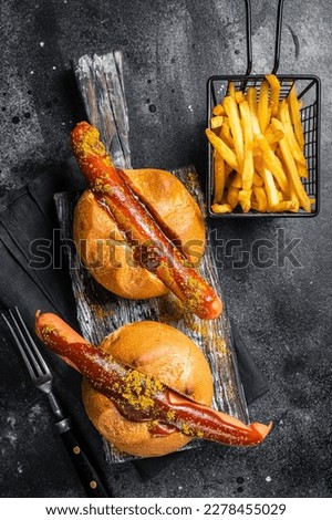 Similar – Foto Bild Würstchen mit Currysoße und Pommes Frites