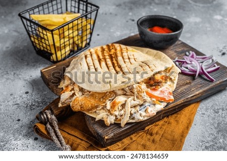 Similar – Foto Bild Döner oder Schawarma-Sandwich auf Holztisch.