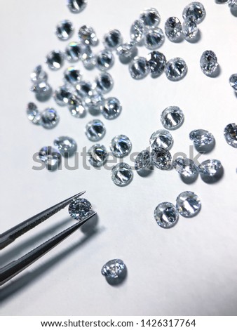 Select many diamond , cz , cubic zirconia , crystal.white background