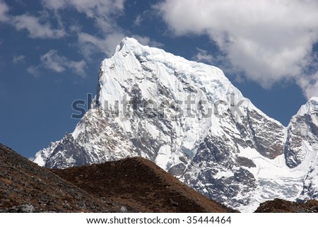 Snow summit of Cholatse mountain, Himalaya