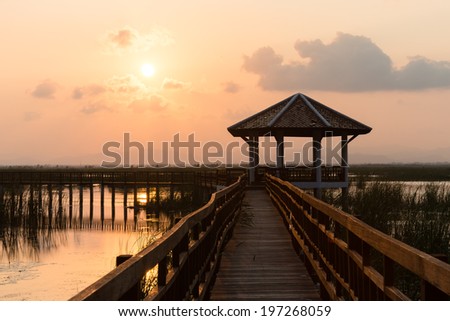 Sunset on the marsh boardwalks.