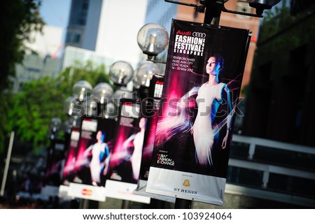 SINGAPORE - MAY 19: Banners along Singapore Orchard Road to advertise Audi Fashion Festival 2012 on May 19, 2012 in Singapore