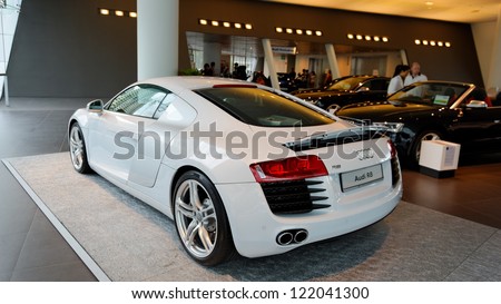 SINGAPORE - DECEMBER 15: Flagship white Audi R8 super car on display at the opening of the new Audi Centre Singapore December 15, 2012 in Singapore