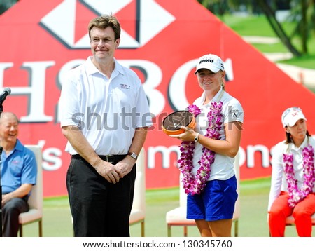 SINGAPORE - MARCH 3: American Stacy Lewis presented with a necklace as she won the HSBC Women\'s Champions at Sentosa Golf Club Serapong Course March 3, 2013 in Singapore