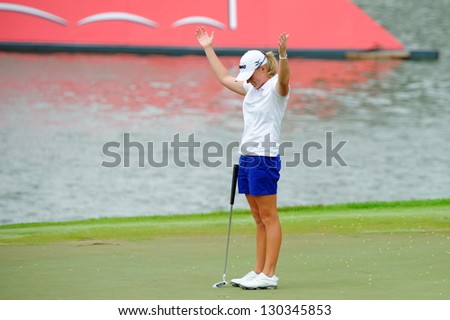 SINGAPORE - MARCH 3: American Stacy Lewis happy with her title win during HSBC Women\'s Champions at Sentosa Golf Club Serapong Course March 3, 2013 in Singapore