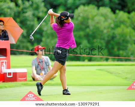 SINGAPORE - MARCH 3: American Danielle Kang teeing off during HSBC Women\'s Champions at Sentosa Golf Club Serapong Course March 3, 2013 in Singapore