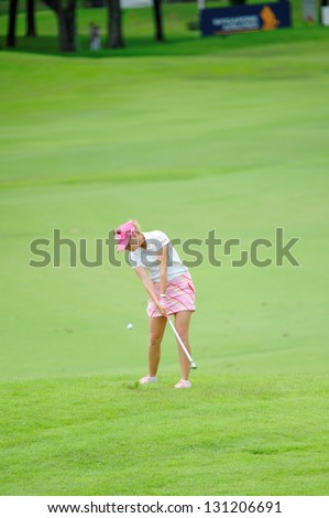 SINGAPORE - MARCH 3: American Paula Creamer putting at the green during HSBC Women\'s Champions at Sentosa Golf Club Serapong Course March 3, 2013 in Singapore
