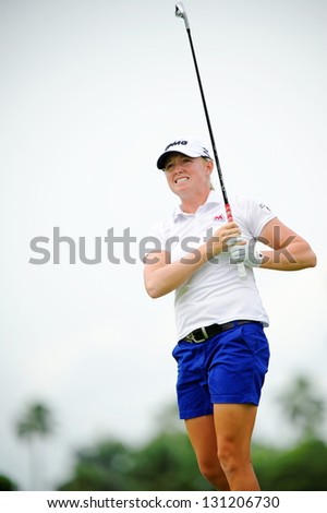 SINGAPORE - MARCH 3: American Stacy Lewis watched her ball landing during HSBC Women\'s Champions at Sentosa Golf Club Serapong Course March 3, 2013 in Singapore