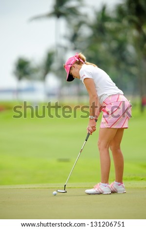 SINGAPORE - MARCH 3: American Paula Creamer putting at the green during HSBC Women's Champions at Sentosa Golf Club Serapong Course March 3, 2013 in Singapore