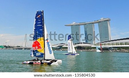SINGAPORE - APRIL 13: Red Bull Sailing team racing at the Extreme Sailing Series race at Marina Bay Reservoir April 13, 2013 in Singapore