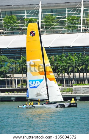 SINGAPORE - APRIL 13: SAP Extreme Sailing team practising at the Extreme Sailing Series race at Marina Bay Reservoir April 13, 2013 in Singapore