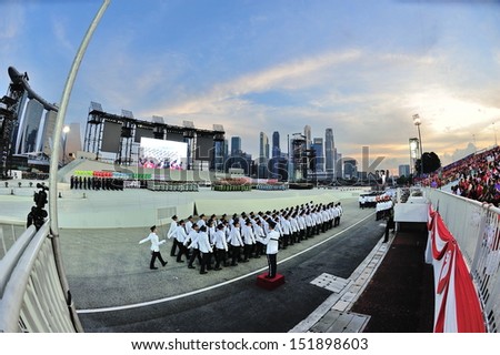 SINGAPORE - JULY 20: Singapore Police Force guard-of-honor contingent marching past during National Day Parade (NDP) Rehearsal 2013 on July 20, 2013 in Singapore