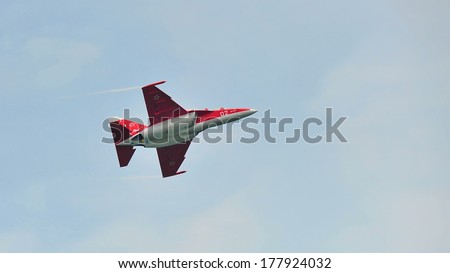 SINGAPORE - FEBRUARY 9: Solo aerobatic flying display by UAC Yak-130 at Singapore Airshow February 9, 2014 in Singapore