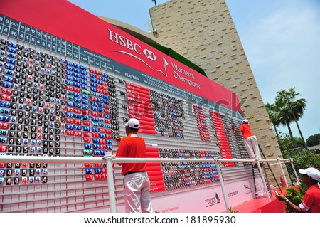 SINGAPORE - MARCH 2: Score board showing game results during HSBC Women\'s Champions at Sentosa Golf Club Serapong Course March 2, 2014 in Singapore