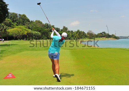 SINGAPORE - MARCH 2: Chinese player Shanshan Feng teeing off at hole 7 during HSBC Women's Champions at Sentosa Golf Club Serapong Course March 2, 2014 in Singapore
