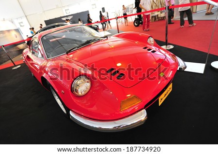 SINGAPORE - APRIL 12: Ferrari Dino 246 GT classic cabriolet on display during Singapore Yacht Show at One Degree 15 Marina Club Sentosa Cove April 12, 2014 in Singapore