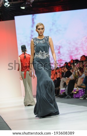 Singapore - May 15: Model showcasing designs from Ashley Isham at Audi Fashion Festival 2014 on May 15, 2014 in Singapore