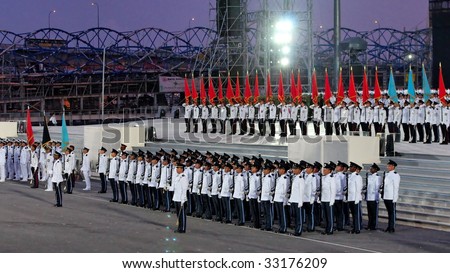 SINGAPORE - JULY 04:  Guard-of-honor contingents standing at attention during Singapore National Day Parade 2009 combined rehearsal at Marina Floating Platform July 04, 2009 in Singapore.