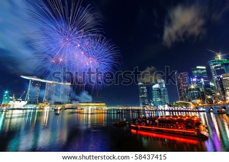 SINGAPORE - JULY 17: Fireworks over Marina Bay during Singapore National Day Parade 2010 Combined Rehearsal July 17, 2010 in Singapore