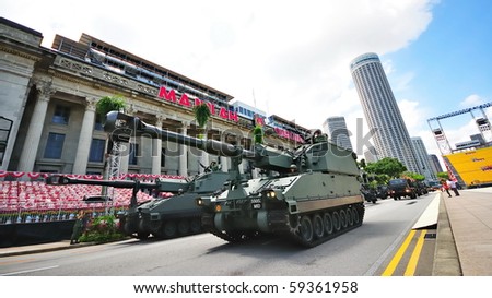 SINGAPORE - AUGUST 09: Columns of Primus self-propelled Howitzer parading during Singapore National Day Parade 2010 at the Padang August 09, 2010 in Singapore