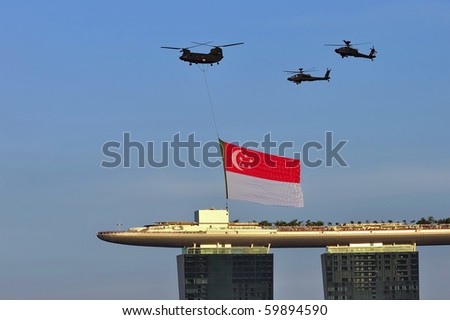 SINGAPORE - AUGUST 09: Fly past of Singapore flag during Singapore National Day Parade 2010 August 09, 2010 in Singapore