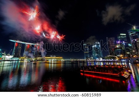 SINGAPORE - JULY 17: Fireworks over Marina Bay during Singapore National Day Parade 2010 Combined Rehearsal July 17, 2010 in Singapore