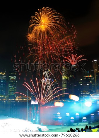 SINGAPORE - JUNE 18: Fireworks display during National Day Parade Singapore 2011 Combined Rehearsal on June 18, 2011 in Singapore.