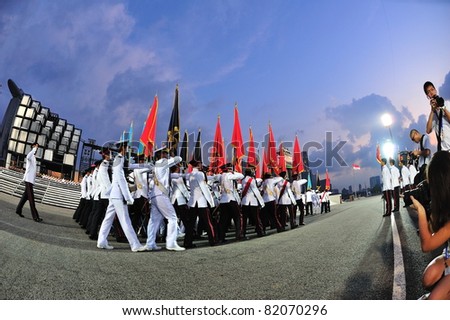 SINGAPORE - JUNE 25: March past of Colors party during National Day Parade Singapore 2011 Combined Rehearsal on June 25, 2011 in Singapore.