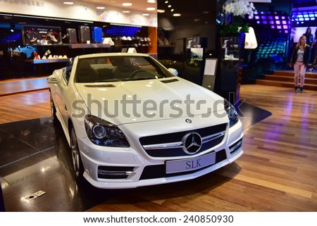 PARIS - SEPTEMBER 24: SLK cabriolet on display at the Mercedes Benz gallery along Champ Elysees, taken on September 24, 2014 in Paris, France