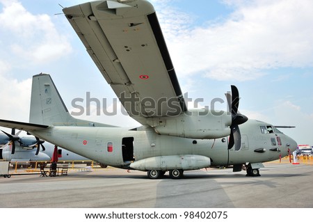 SINGAPORE - FEBRUARY 17: Italian Air Force C-27J Spartan cargo aircraft on display at Singapore Airshow February 17, 2012 in Singapore